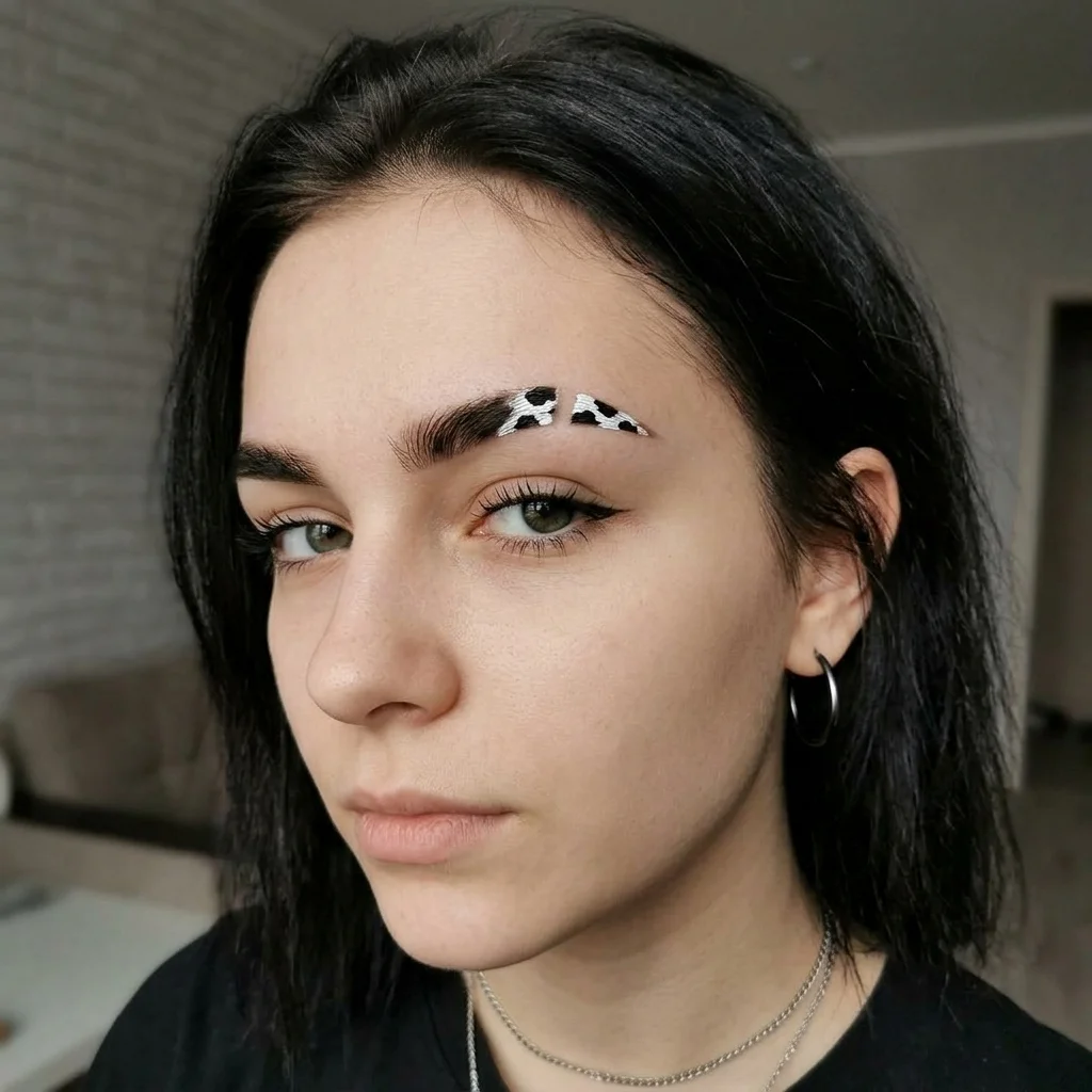 Cow print eyebrow slit accent